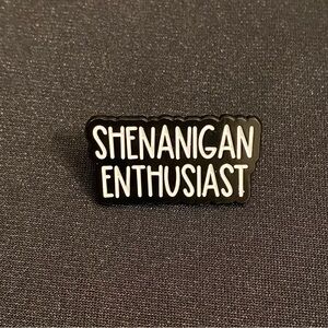 Don’t be surprised if this enamel pin gets you smiles and helps start the fun